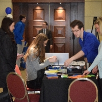 Students working on activity at GradFest